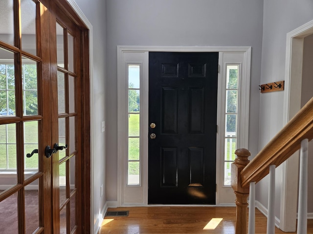 3564 Elliott Rd, Pinewood, SC 29125 - entryway featuring wood finished floors, french doors, and baseboards