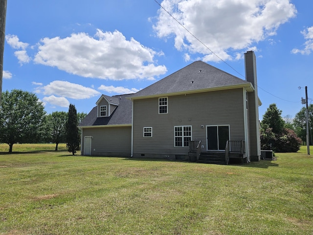 3564 Elliott Rd, Pinewood, SC 29125 - rear view of house featuring a chimney, a yard, central AC, and crawl space