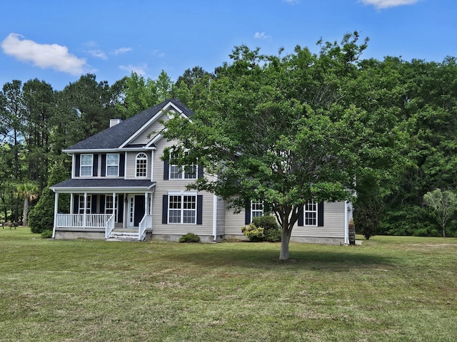 3564 Elliott Rd, Pinewood, SC 29125 - colonial inspired home with a porch, a front lawn, and a chimney