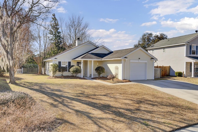 view of front of home featuring a front yard and a garage