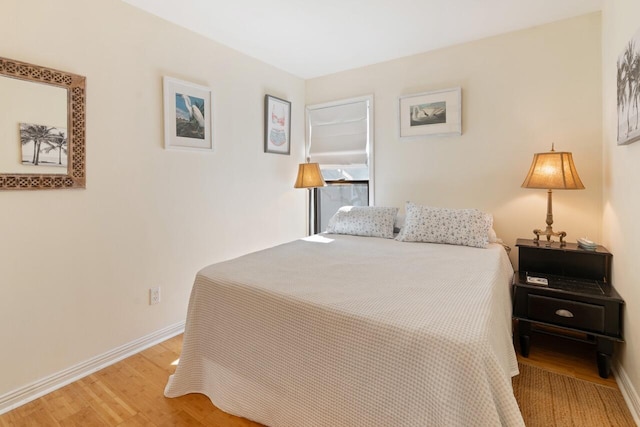 bedroom with light hardwood / wood-style floors