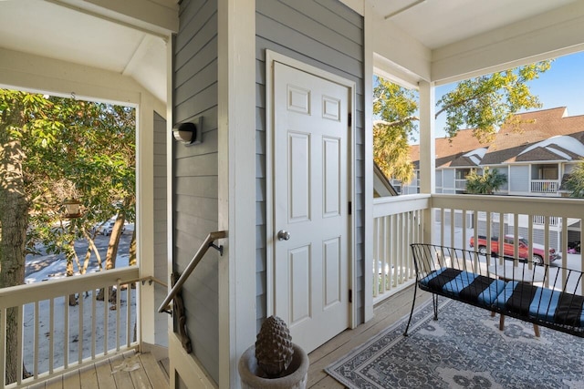 balcony featuring a porch