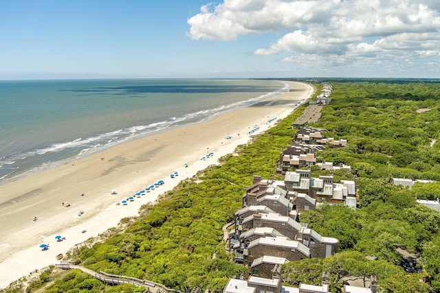 bird's eye view featuring a beach view and a water view