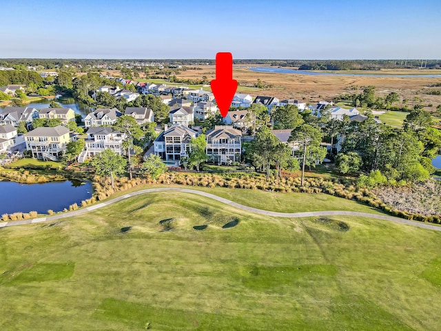 birds eye view of property featuring a residential view, golf course view, and a water view