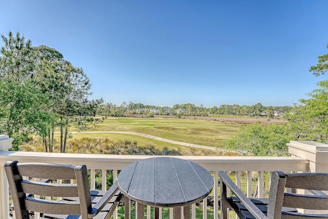 balcony featuring golf course view