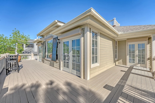 wooden deck with french doors