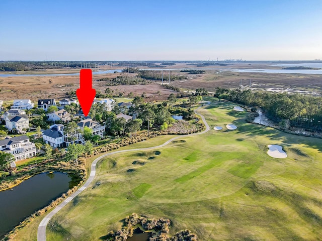 birds eye view of property featuring a water view and view of golf course