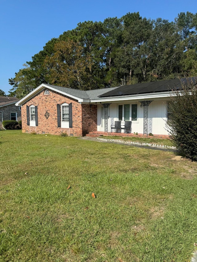 single story home with a front yard