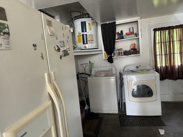 8520 Delhi Rd, North Charleston, SC 29406 - washroom with water heater and washing machine and clothes dryer
