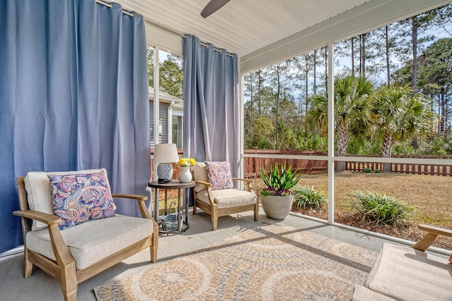 sunroom with a ceiling fan