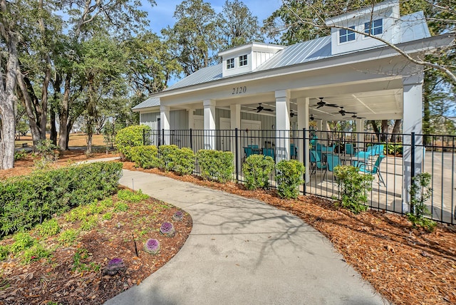 view of property's community with fence