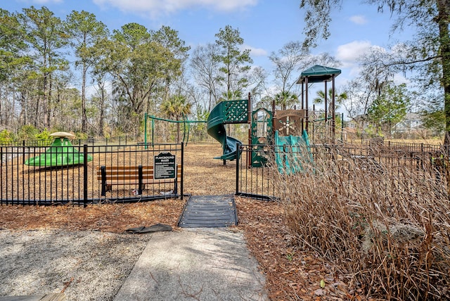 communal playground featuring fence