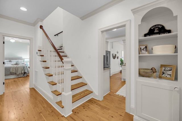 701 Hibbens Grant Blvd, Mount Pleasant, SC 29464 - stairway with wood finished floors, crown molding, and recessed lighting