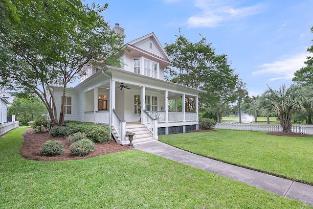 701 Hibbens Grant Blvd, Mount Pleasant, SC 29464 - view of front facade featuring a ceiling fan, a chimney, a porch, and a front lawn