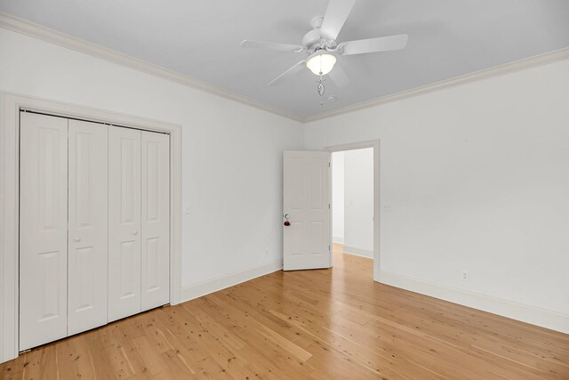 701 Hibbens Grant Blvd, Mount Pleasant, SC 29464 - unfurnished bedroom featuring ornamental molding, light wood-style floors, a closet, and a ceiling fan