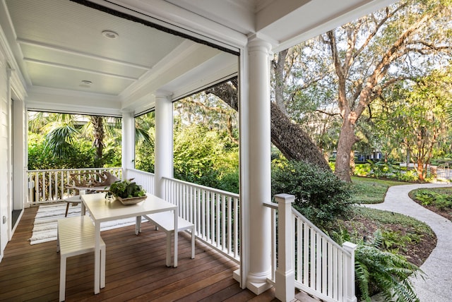 wooden terrace featuring a porch