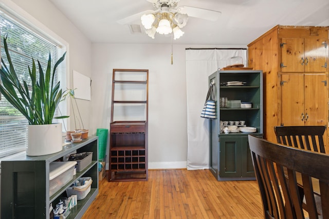 bedroom featuring light wood-type flooring and ceiling fan