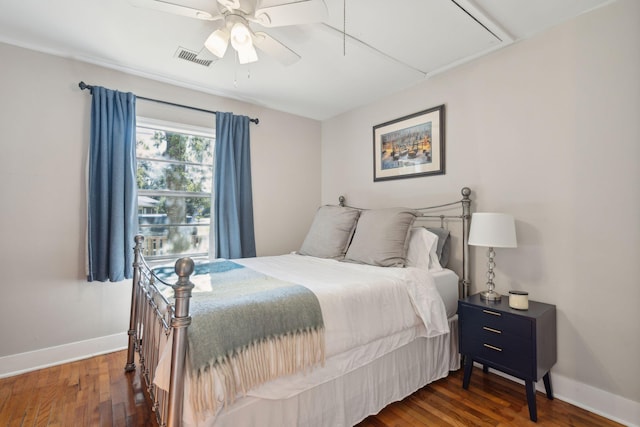 bedroom featuring ceiling fan and dark hardwood / wood-style flooring