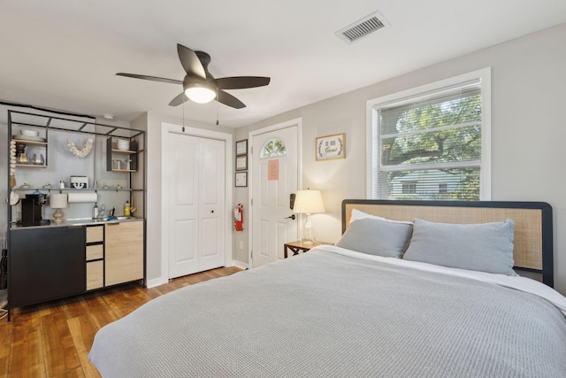 bedroom with ceiling fan and light hardwood / wood-style flooring