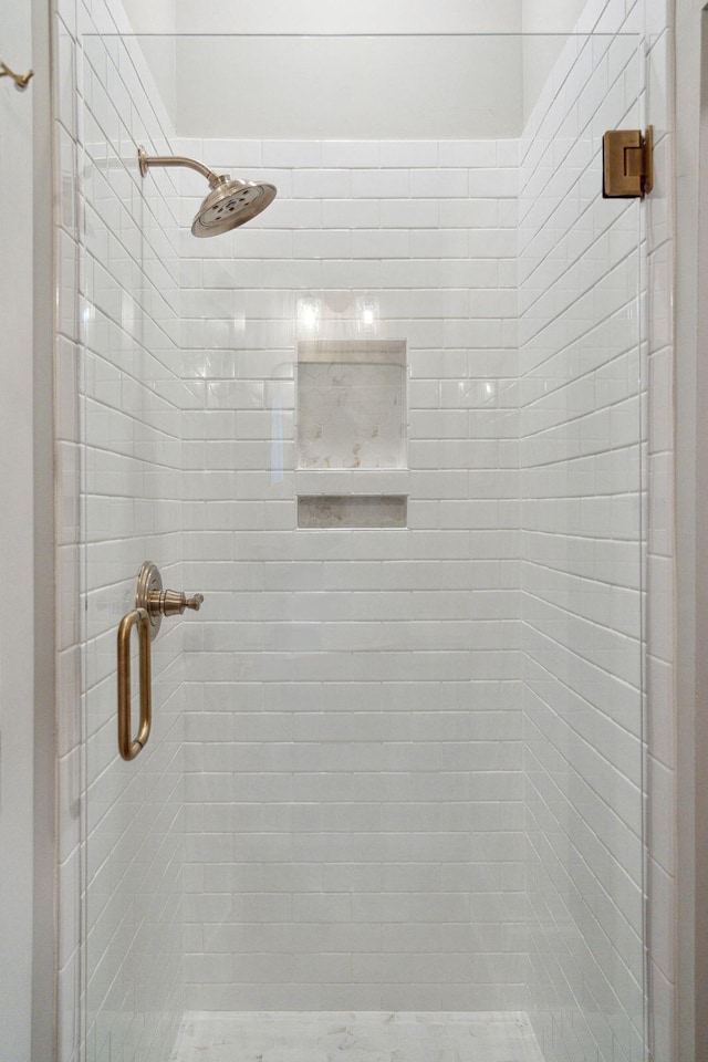 full bathroom featuring a stall shower