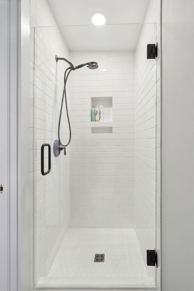 bathroom featuring a stall shower