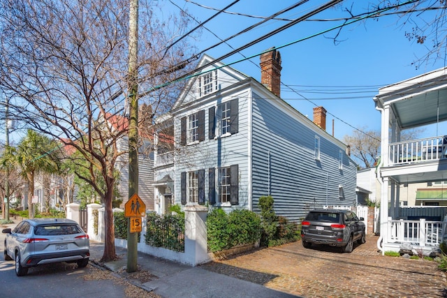 exterior space featuring a chimney