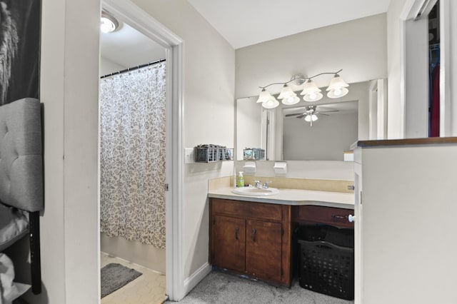 bathroom with vanity, a shower with shower curtain, and ceiling fan