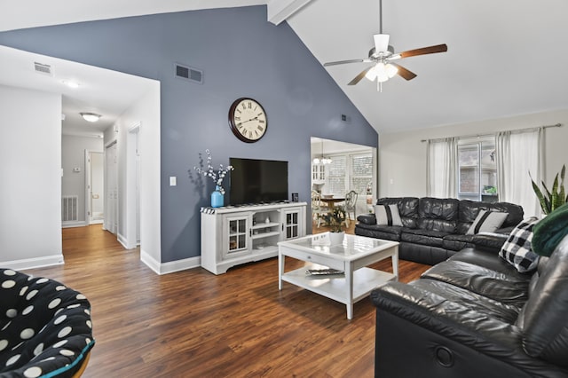 living room with visible vents, ceiling fan with notable chandelier, baseboards, and wood finished floors