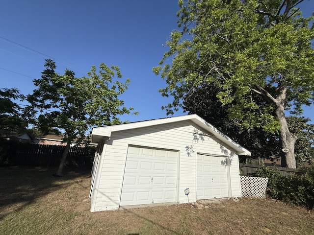 detached garage with fence