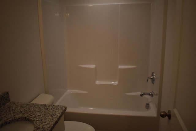 full bathroom with vanity, shower / bath combination, and toilet