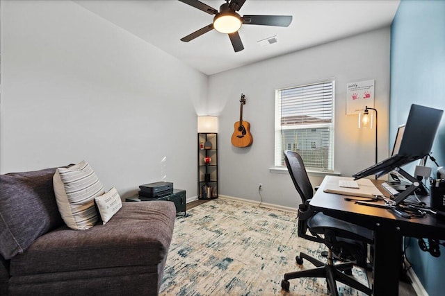 office space with ceiling fan