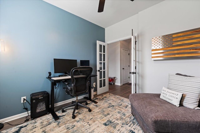 home office with french doors, ceiling fan, and wood-type flooring