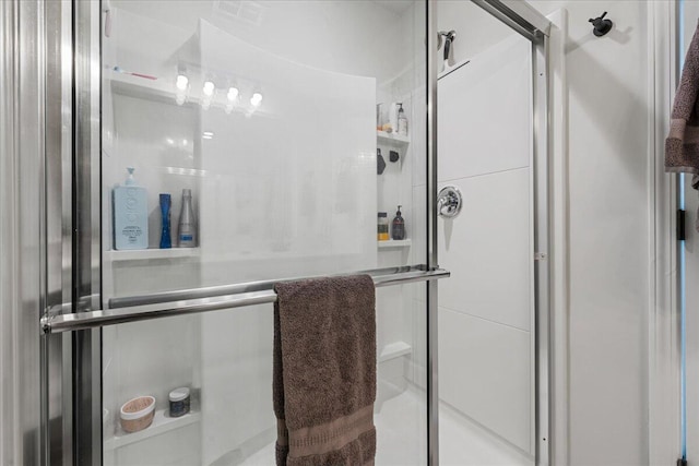 bathroom with an enclosed shower