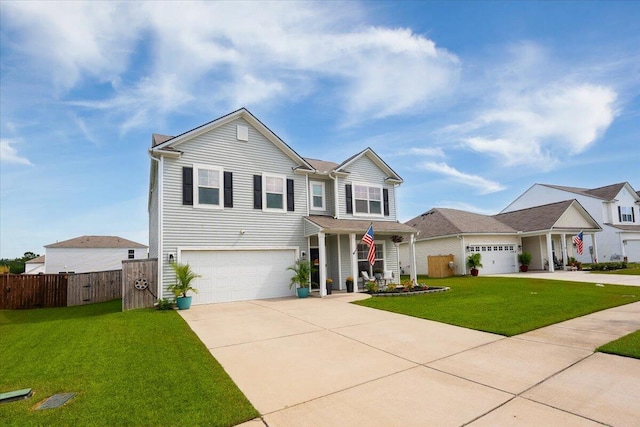 view of front of house featuring a garage and a front yard