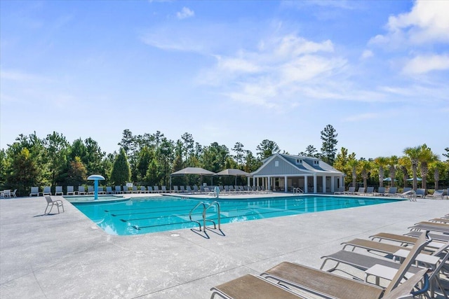 view of pool featuring a patio area