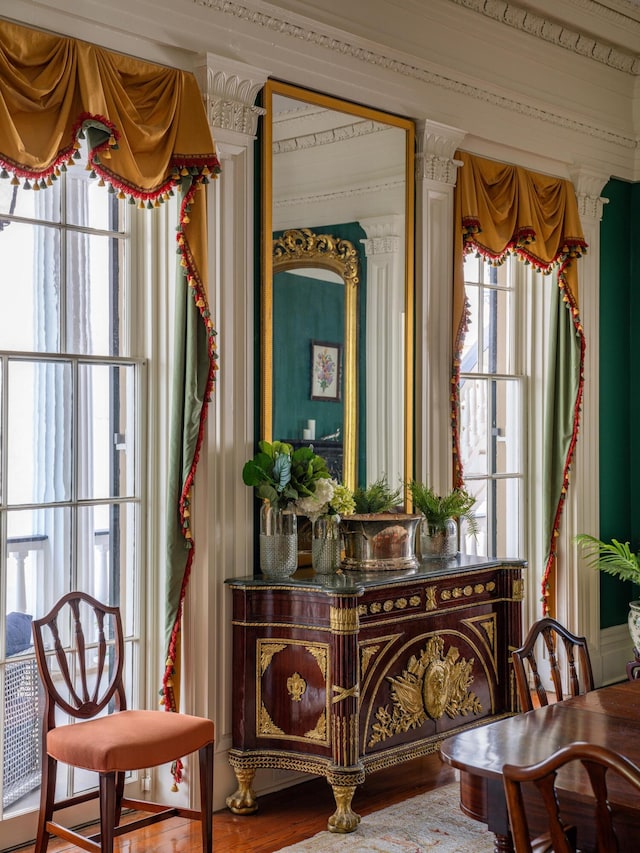 living area featuring ornamental molding