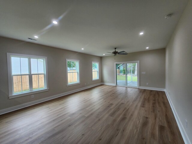 1207 Albert Storm Ave, Moncks Corner, SC 29461 - spare room with wood finished floors, recessed lighting, baseboards, a smoke detector, and a ceiling fan