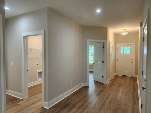 1207 Albert Storm Ave, Moncks Corner, SC 29461 - entrance foyer featuring wood finished floors, a chandelier, baseboards, and recessed lighting