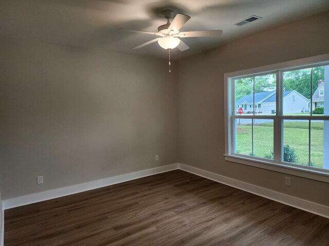 1207 Albert Storm Ave, Moncks Corner, SC 29461 - empty room featuring dark wood-style floors, baseboards, and a ceiling fan