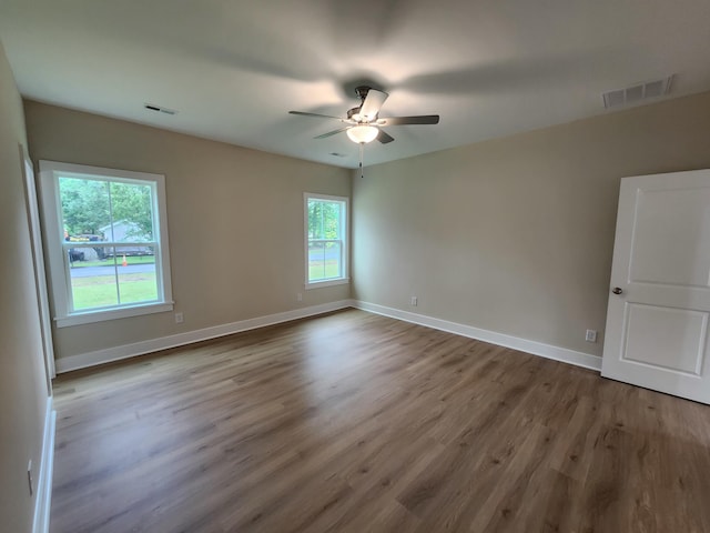 1207 Albert Storm Ave, Moncks Corner, SC 29461 - spare room featuring a ceiling fan, wood finished floors, and baseboards
