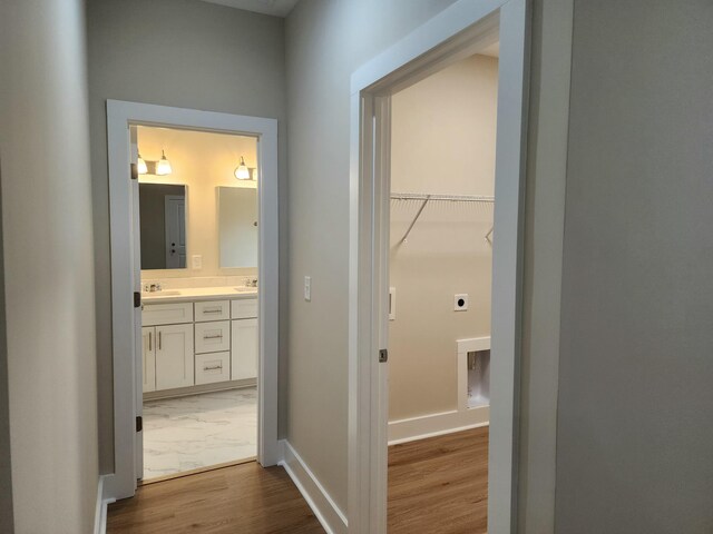 1207 Albert Storm Ave, Moncks Corner, SC 29461 - hall featuring a sink, baseboards, and marble finish floors