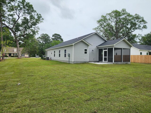 1207 Albert Storm Ave, Moncks Corner, SC 29461 - rear view of house with a sunroom and cooling unit