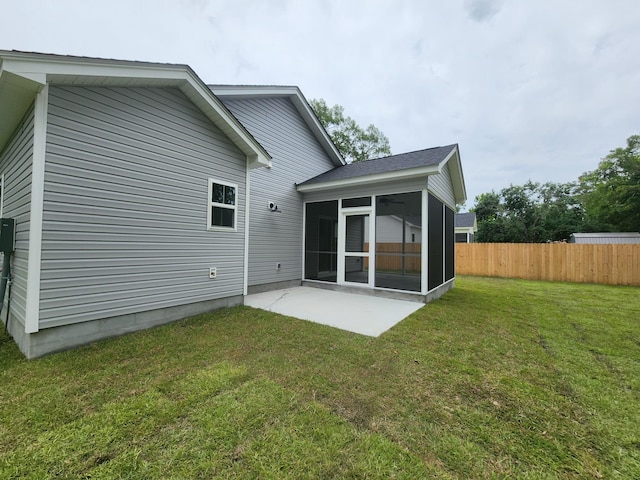1207 Albert Storm Ave, Moncks Corner, SC 29461 - rear view of house with a sunroom and a patio