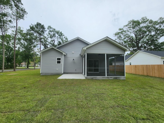 1207 Albert Storm Ave, Moncks Corner, SC 29461 - rear view of house with a sunroom and a patio area