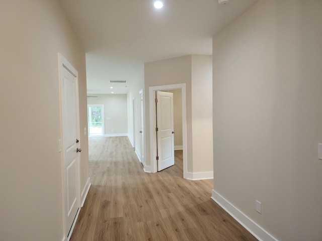 1207 Albert Storm Ave, Moncks Corner, SC 29461 - hallway with baseboards and light wood-type flooring