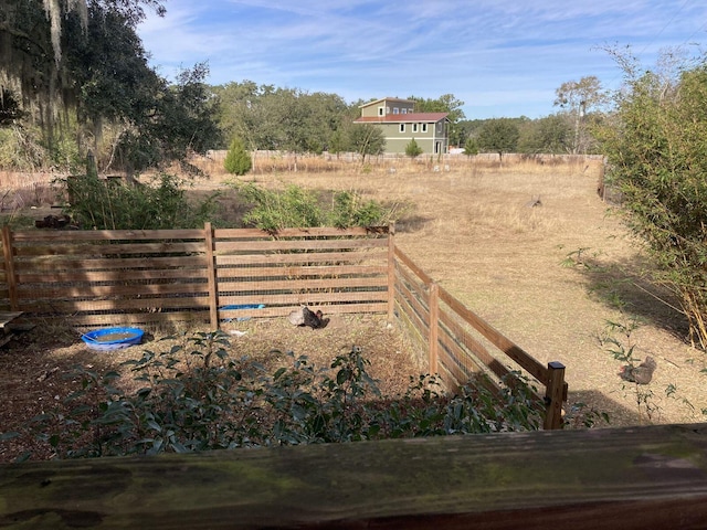 view of yard featuring a rural view