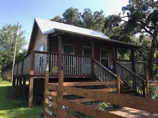 exterior space with a front yard