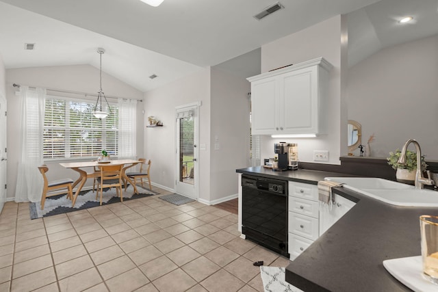 kitchen with sink, black dishwasher, light tile patterned flooring, lofted ceiling, and white cabinets