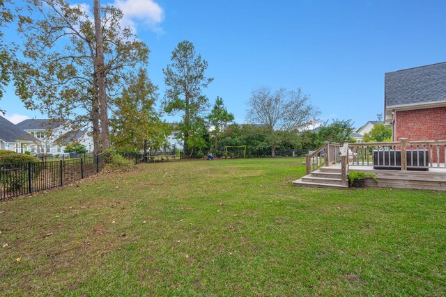 view of yard featuring a deck