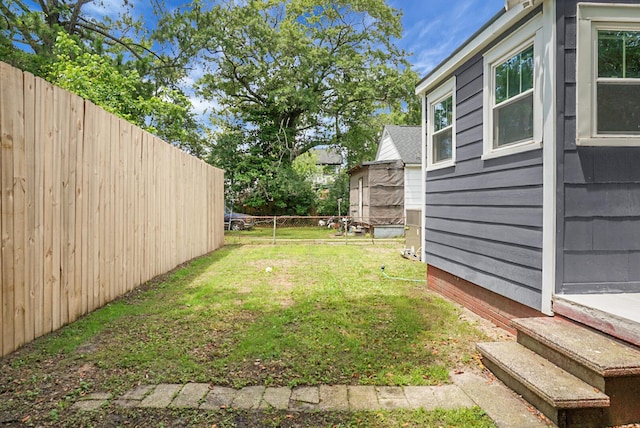 view of yard featuring entry steps